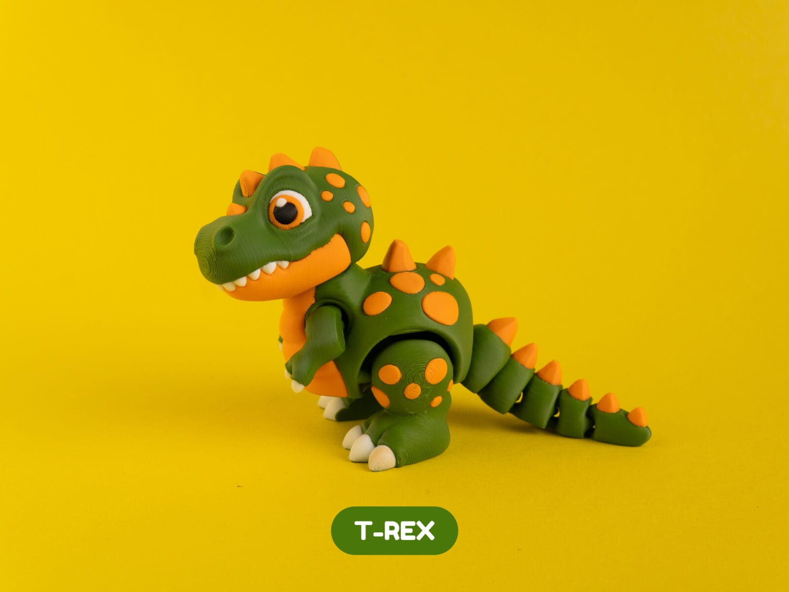Articulated T-Rex dinosaur figure, side view.