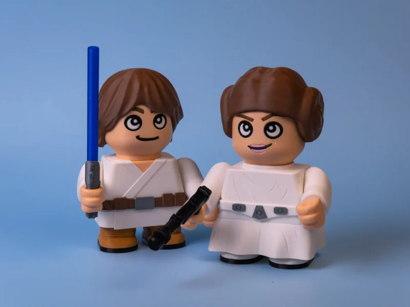 galactic hero and space princess figures duo