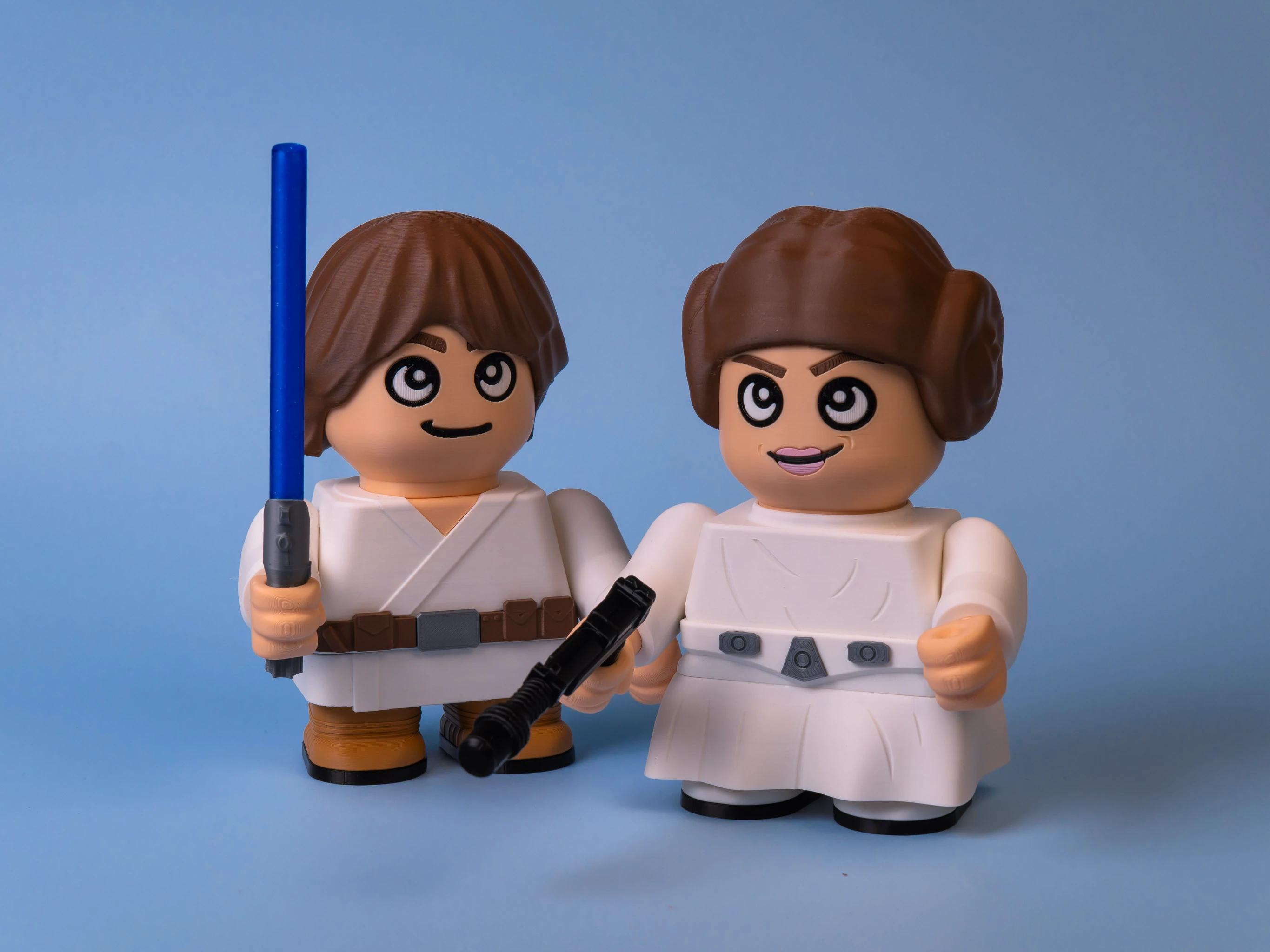 galactic hero and space princess figures duo