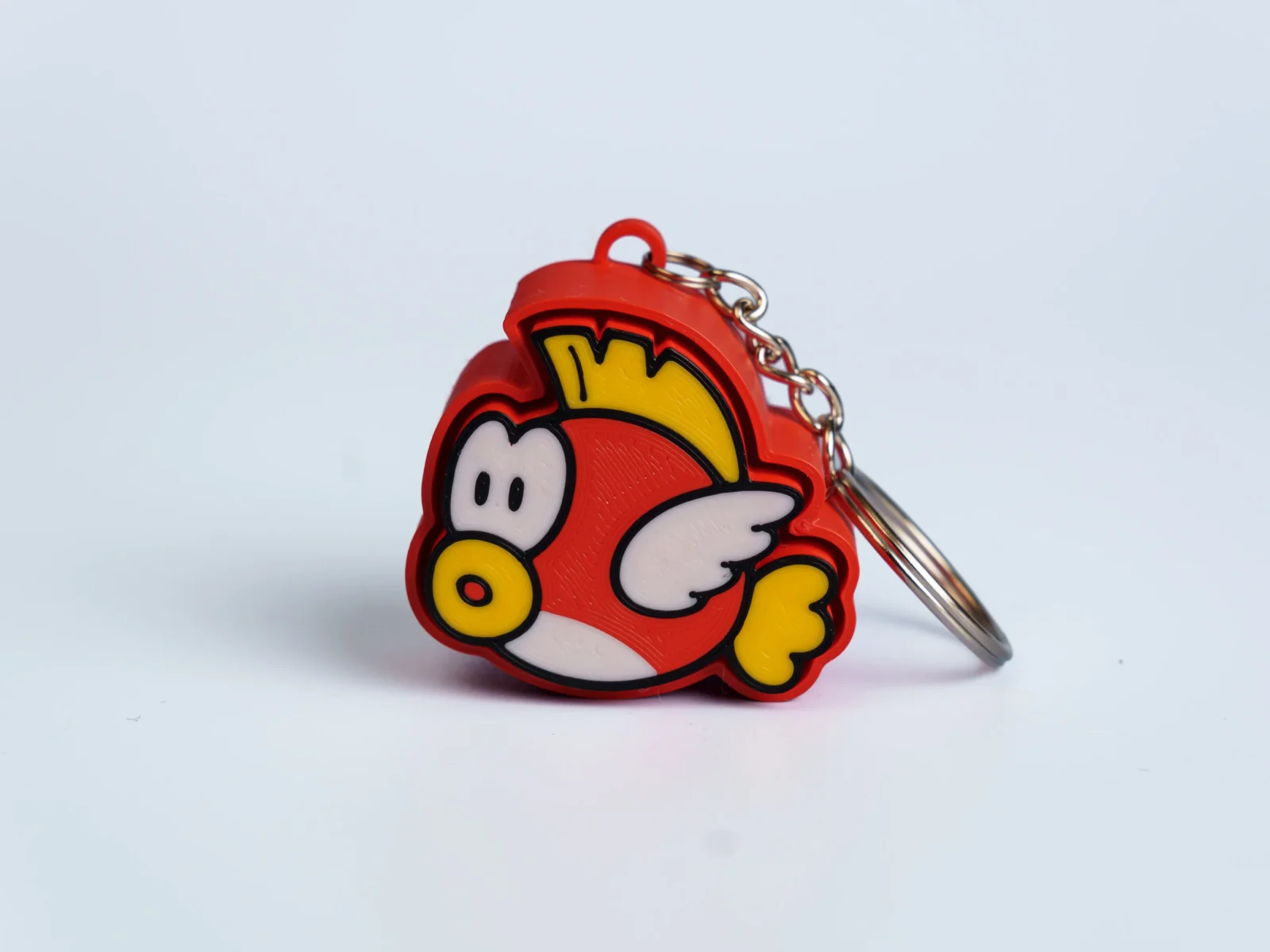 Arcade Quest Icons clicker fidget keychain - winged fish