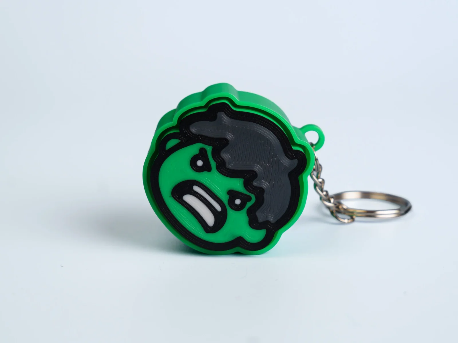 Comic Hero Crew clicker fidget keychain - green strongman