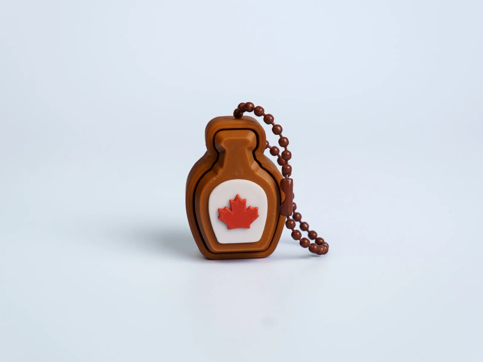 Oh Canada clicker fidget keychain - maple syrup