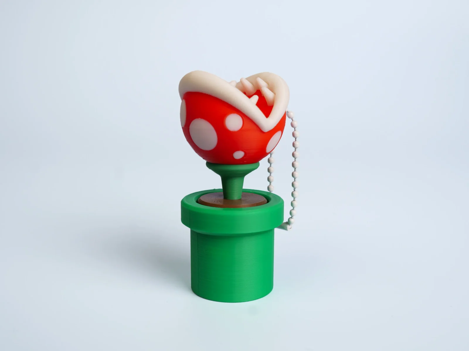 Retro Platform Adventure clicker fidget keychain - pipe plant