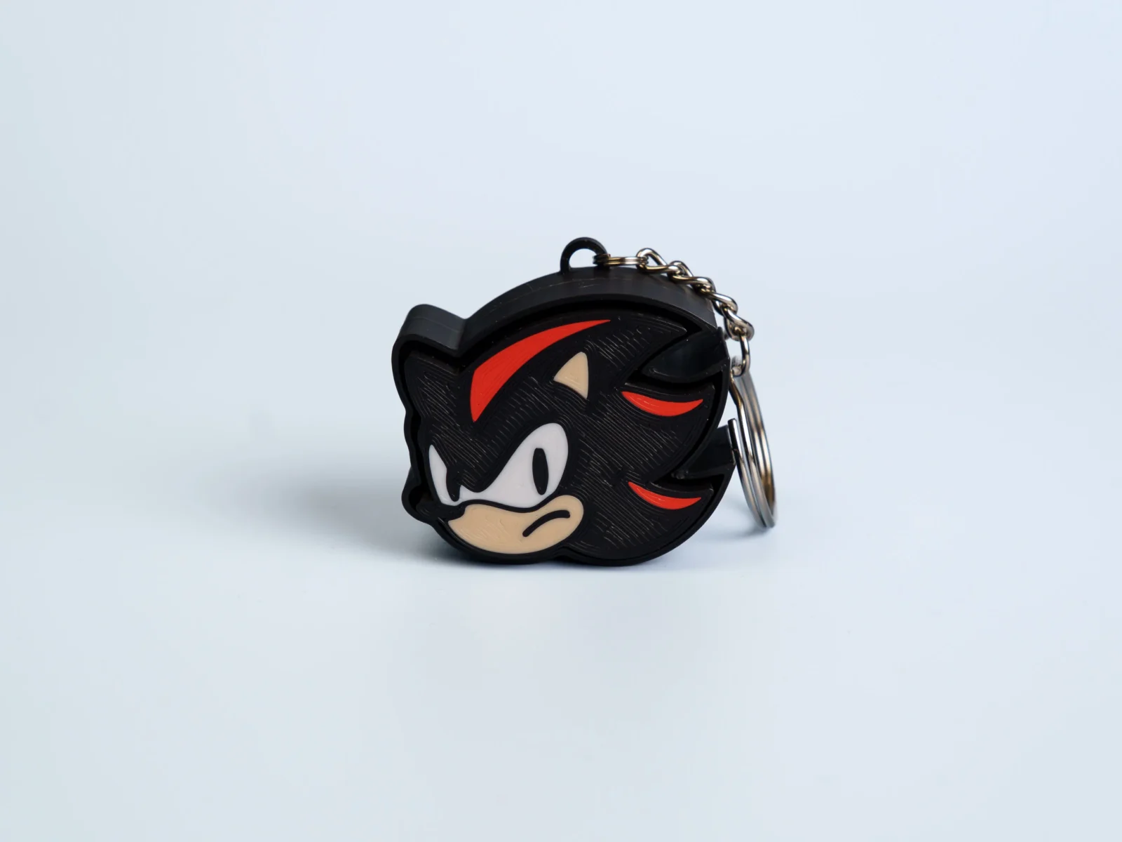 Speedy Critter Crew clicker fidget keychain - black red hedgehog