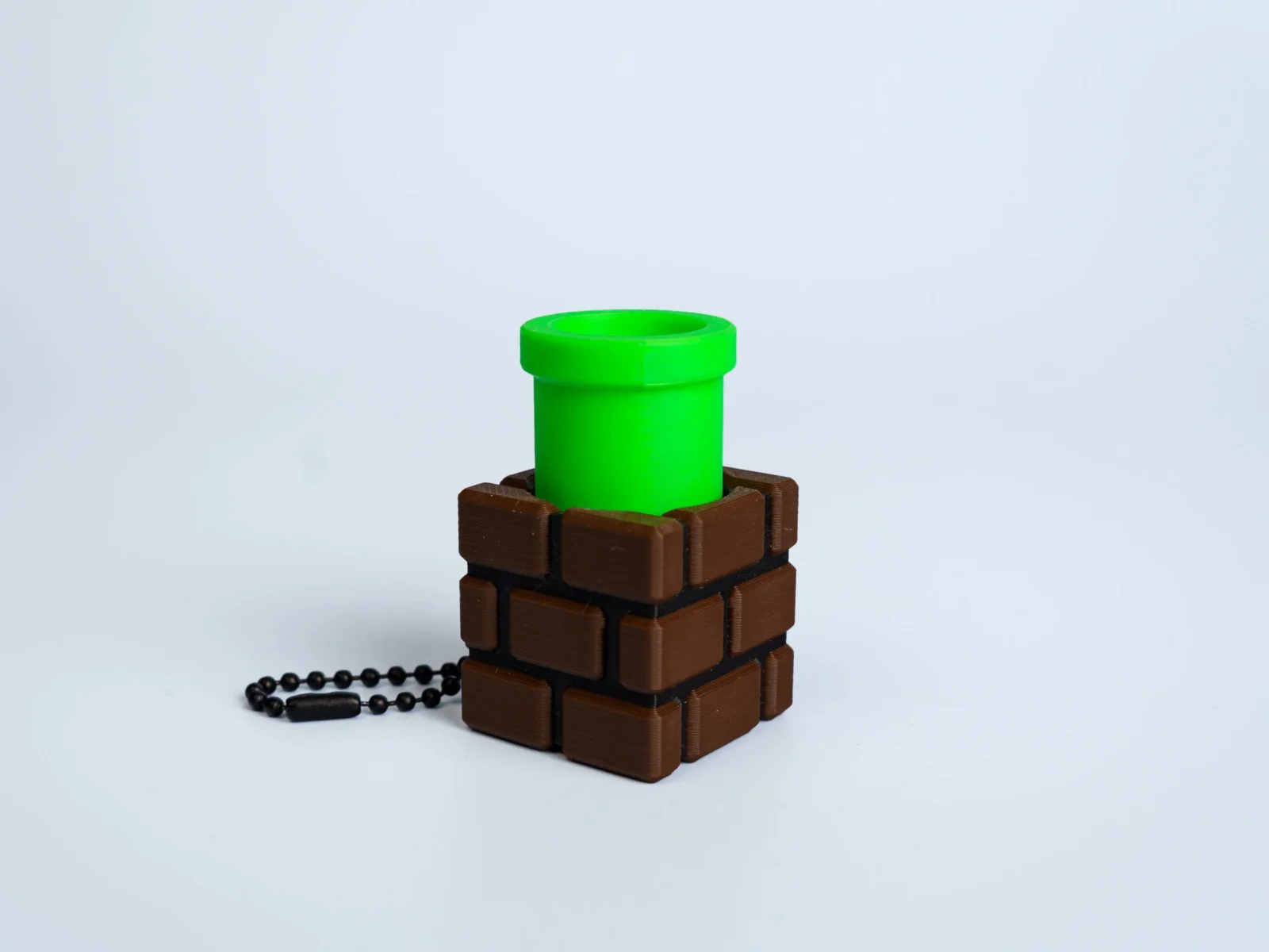 Retro Platform Adventure clicker fidget keychain - brick pipe