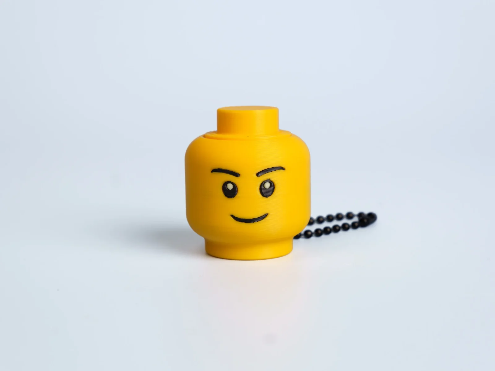 Yellow Expression Faces clicker fidget keychain - smiling face