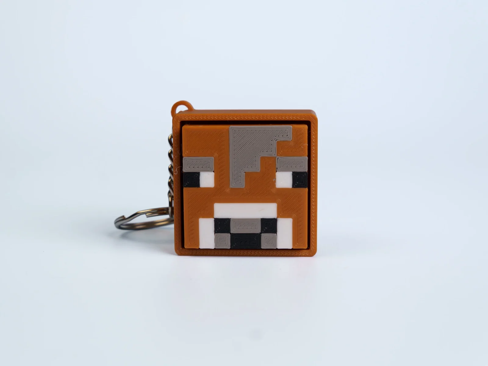 Pixel Block World clicker fidget keychain - brown pixel cow