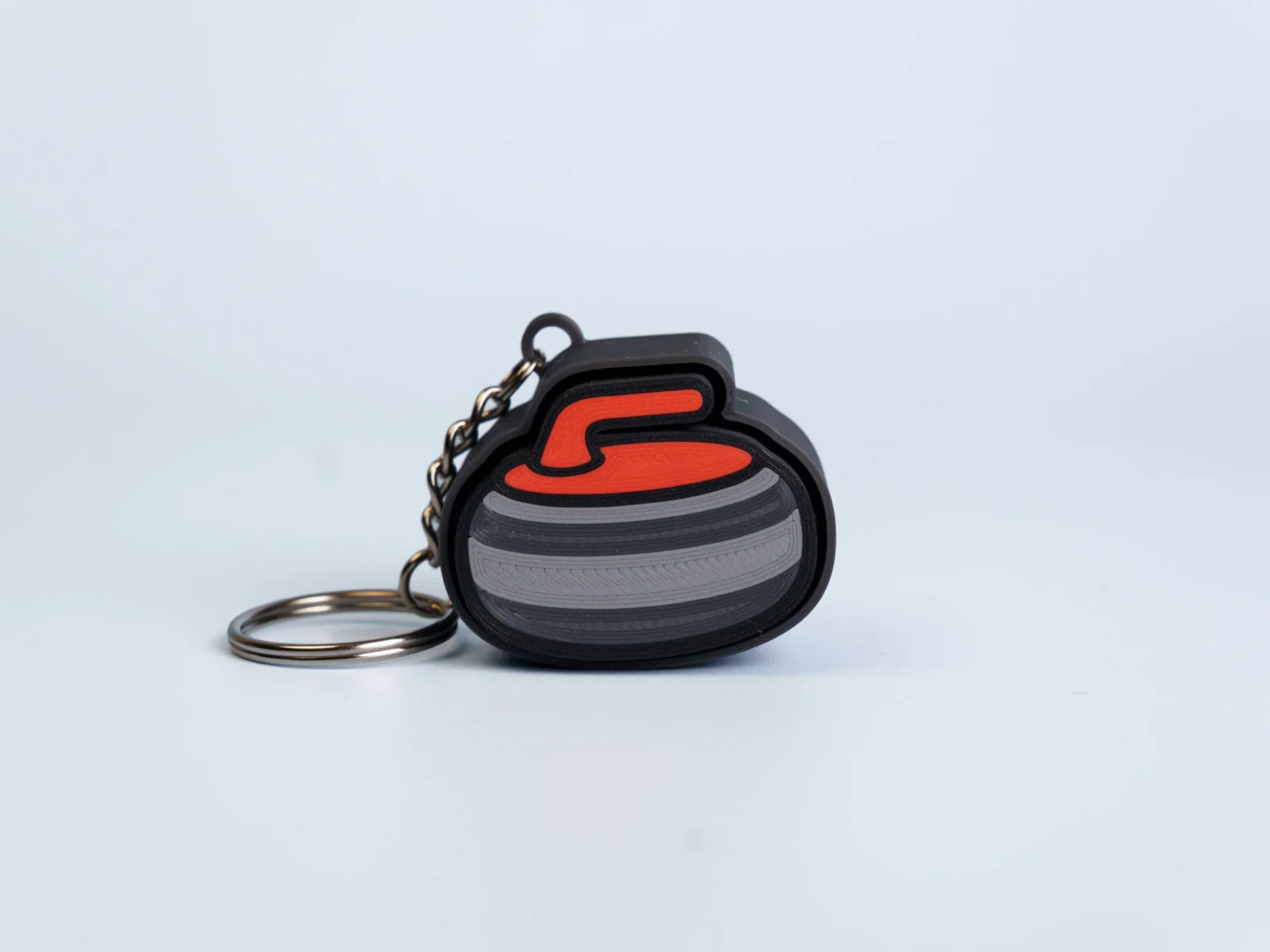 Sports clicker fidget keychain - curling stone