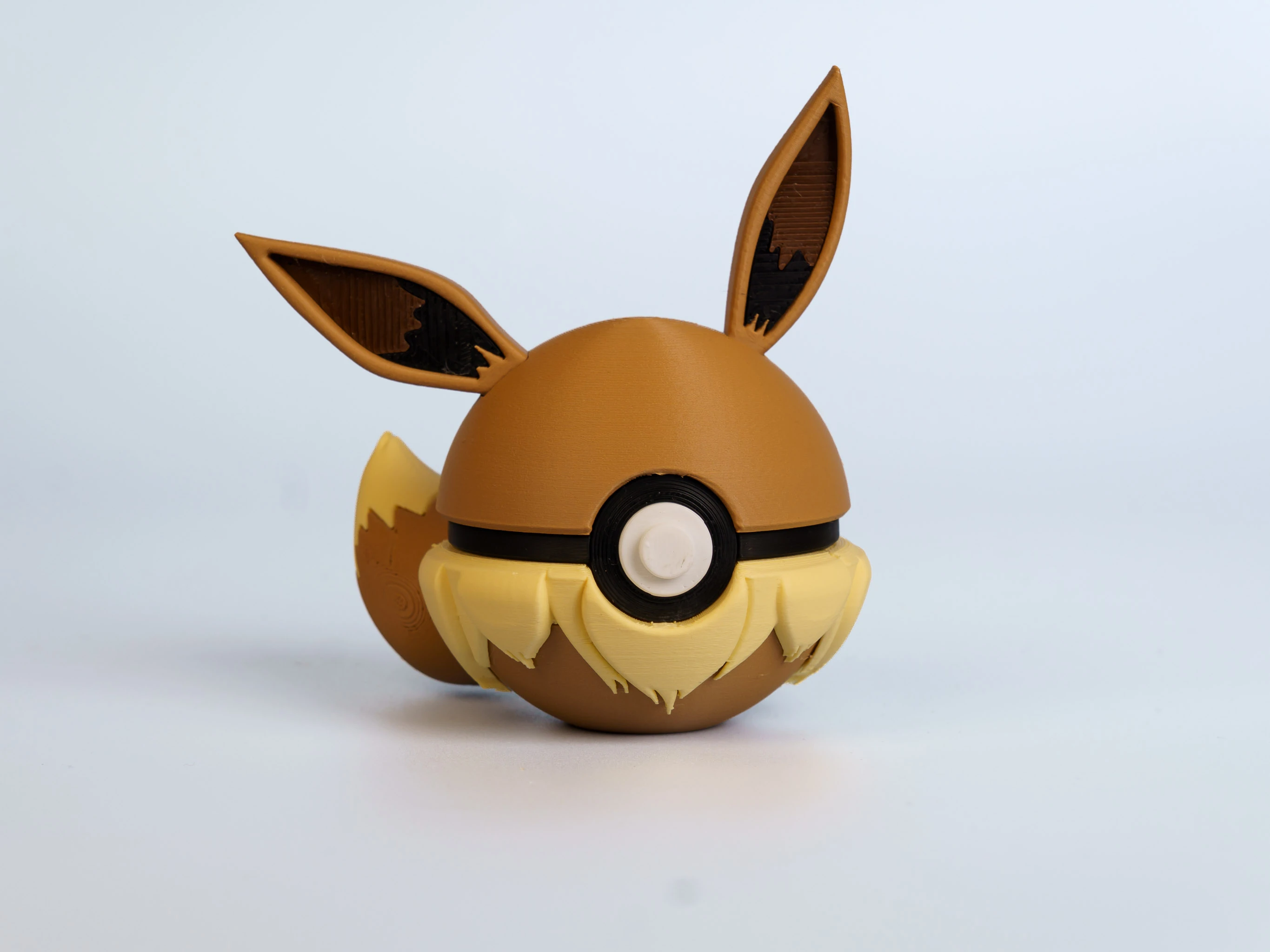 Adaptive Fox Spark Creature Ball collectible figure - front view