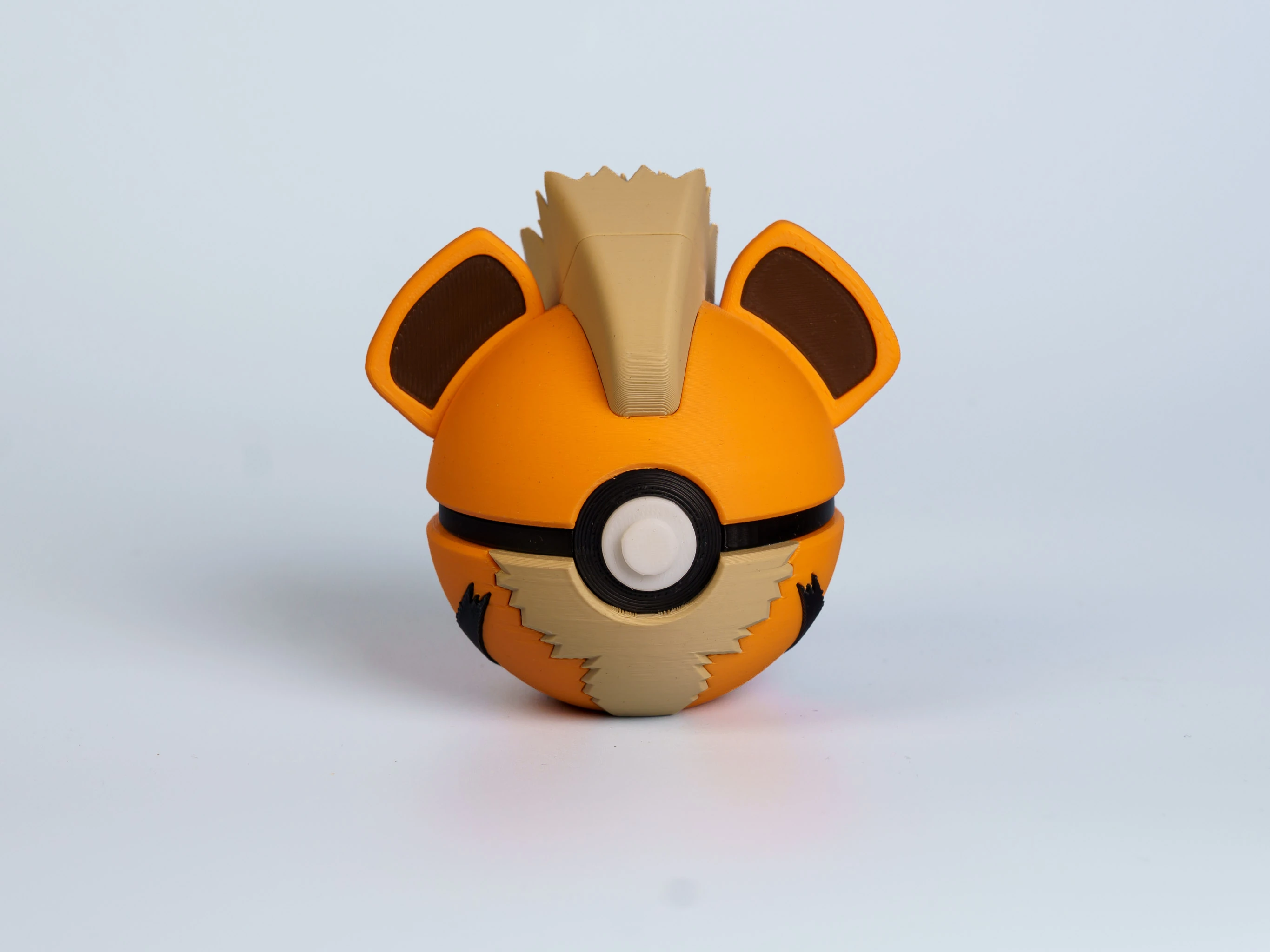 Fire Pup Sentinel Creature Ball collectible figure - front view