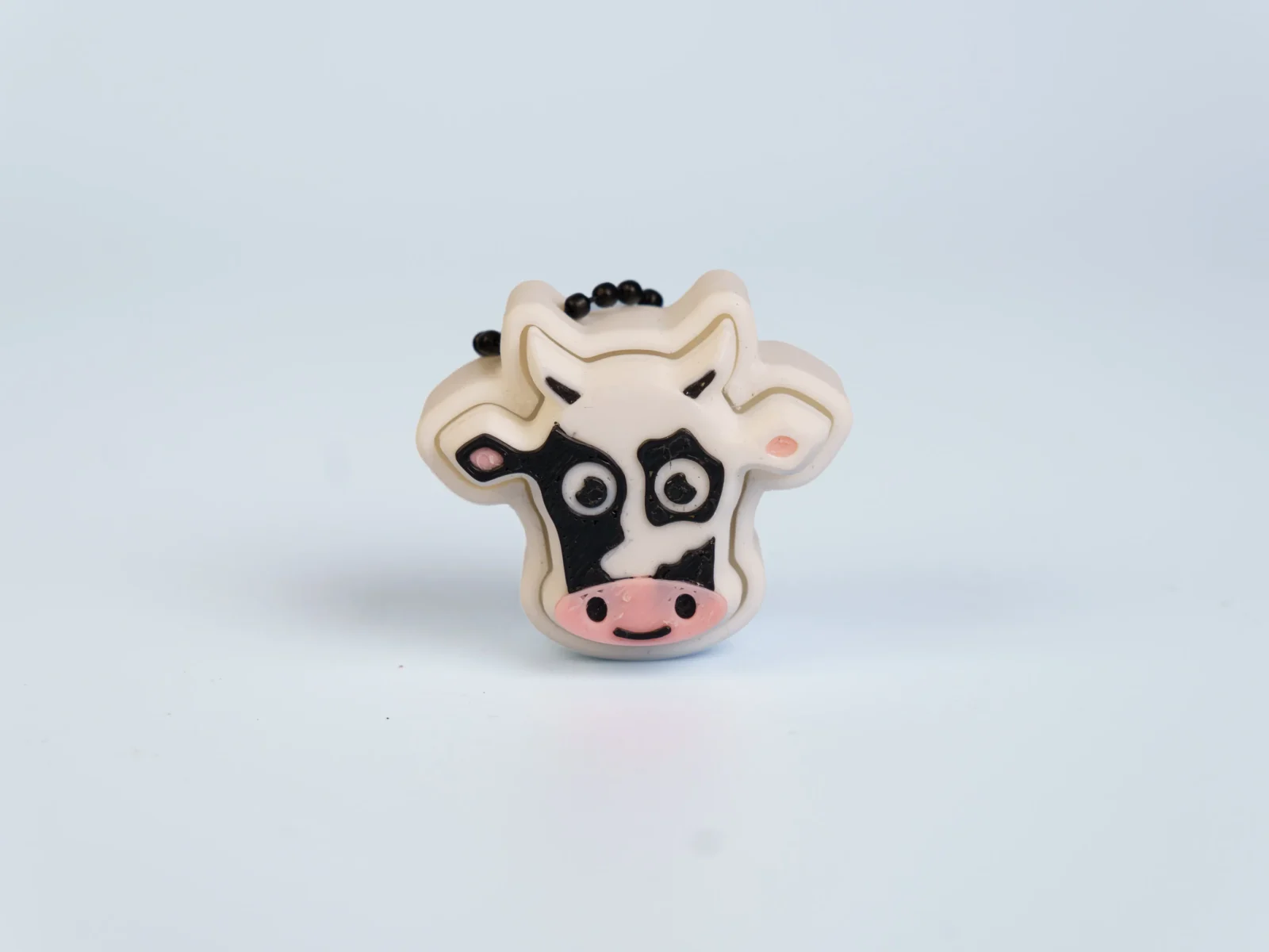 Animal Friends clicker fidget keychain - black white cow