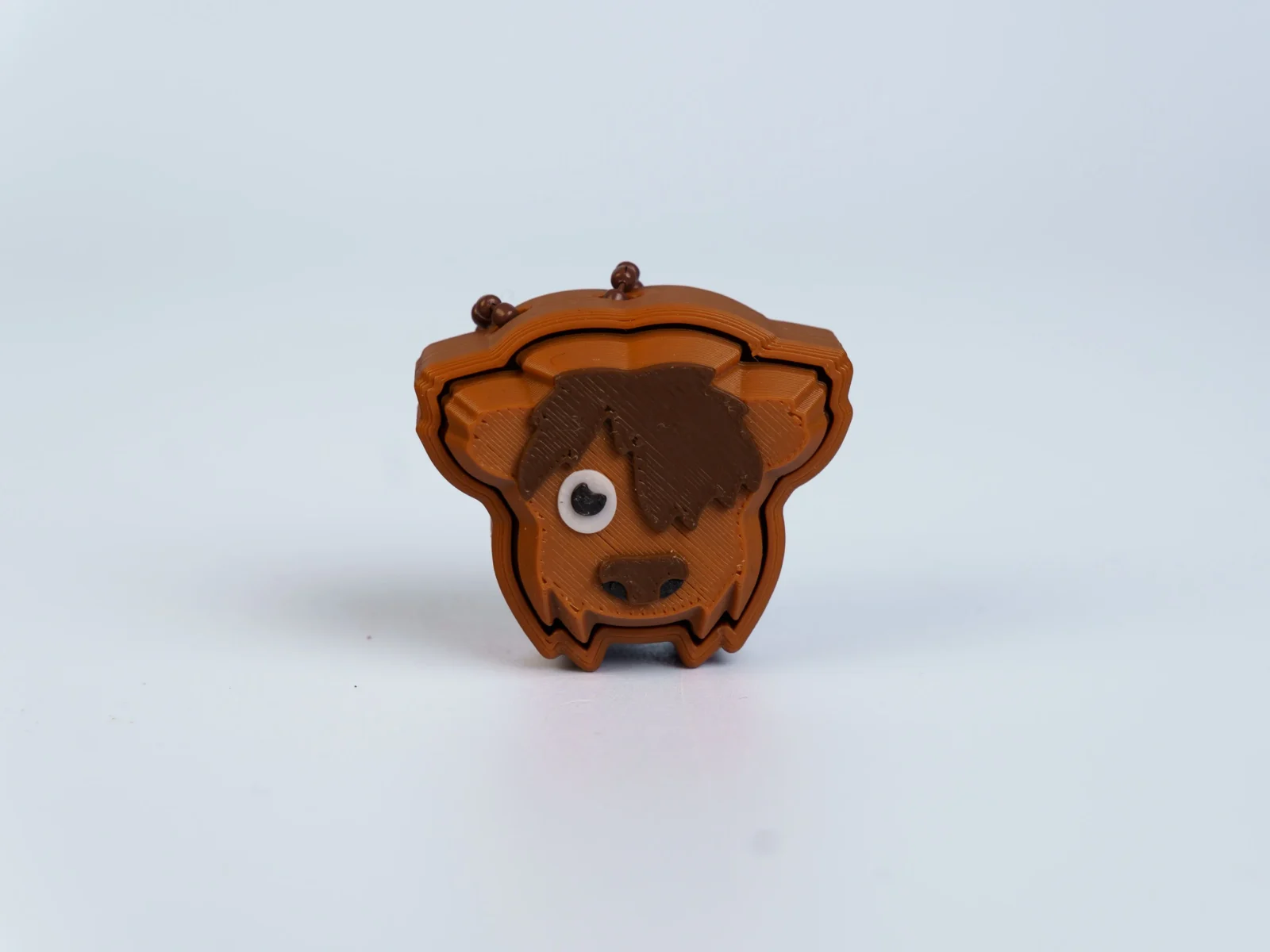 Animal Friends clicker fidget keychain - brown highland cow