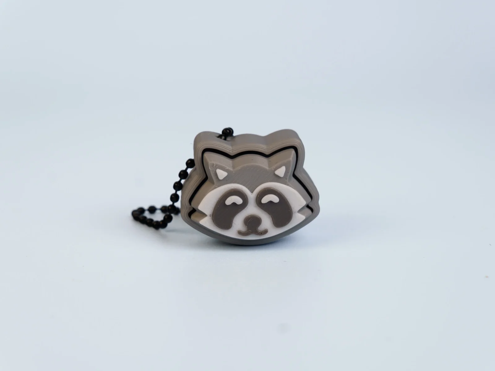 Animal Friends clicker fidget keychain - grey raccoon